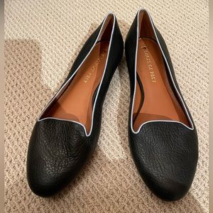 Black pebble leather slip on flats